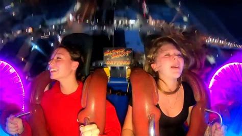 Girl has a very unique reaction to the sling shot ride